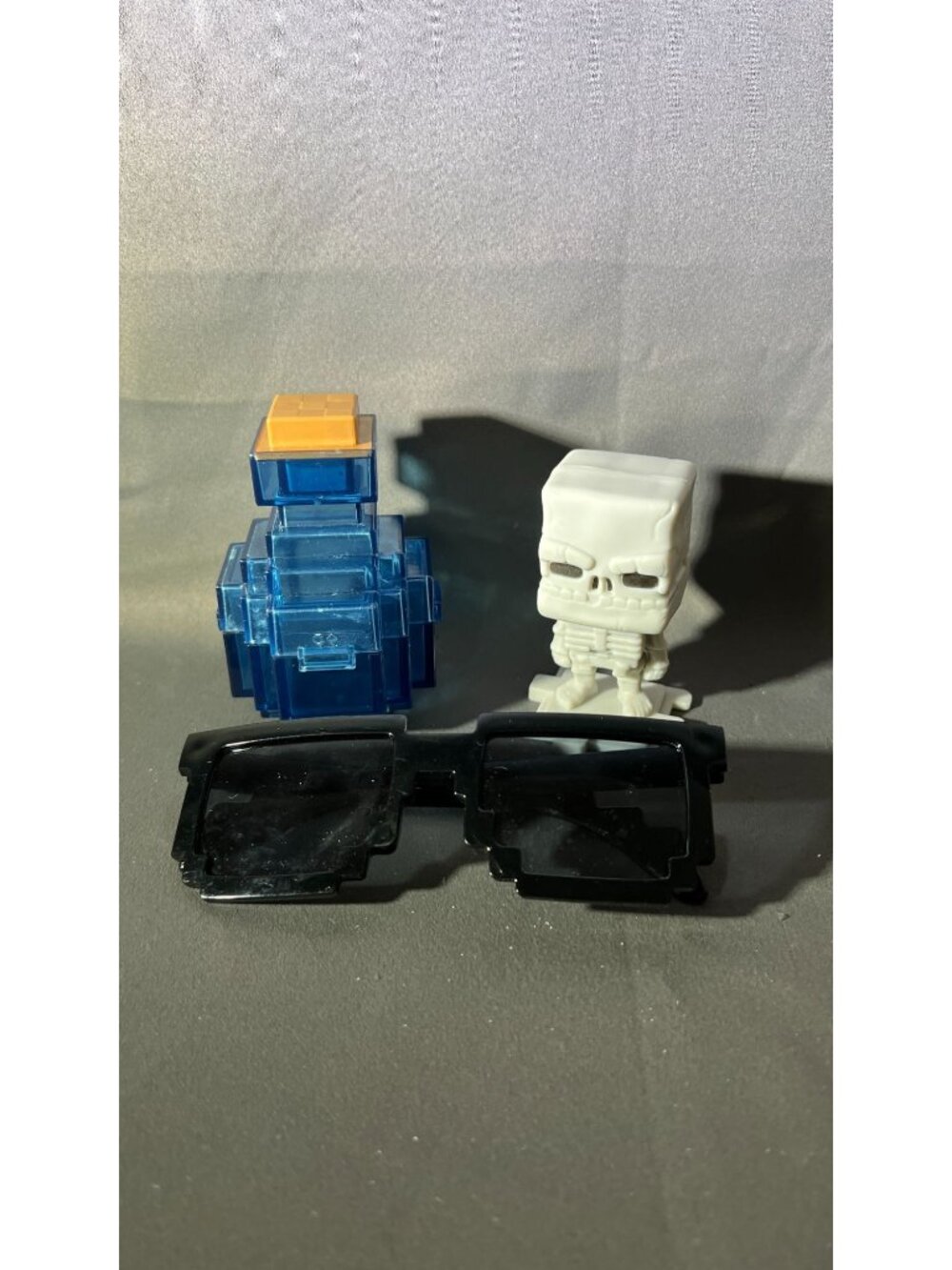 Minecraft Sunglasses Blue Stackable Puzzle & Skeleton Figurine Set